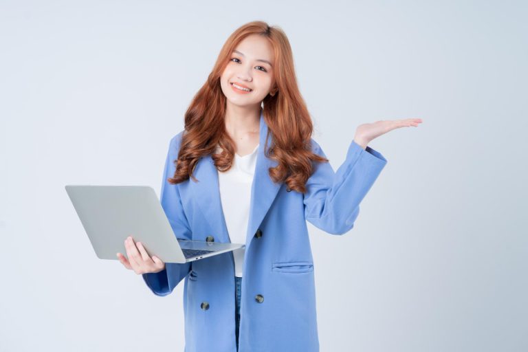 young-asian-businesswoman-using-laptop-white-background